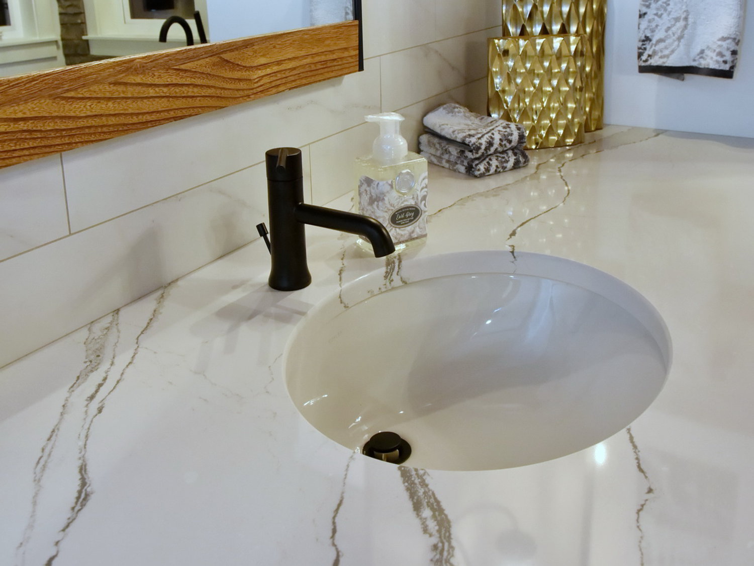 Matte Black Delta Bathroom Faucet, Undermount Sink, Cambria Countertop