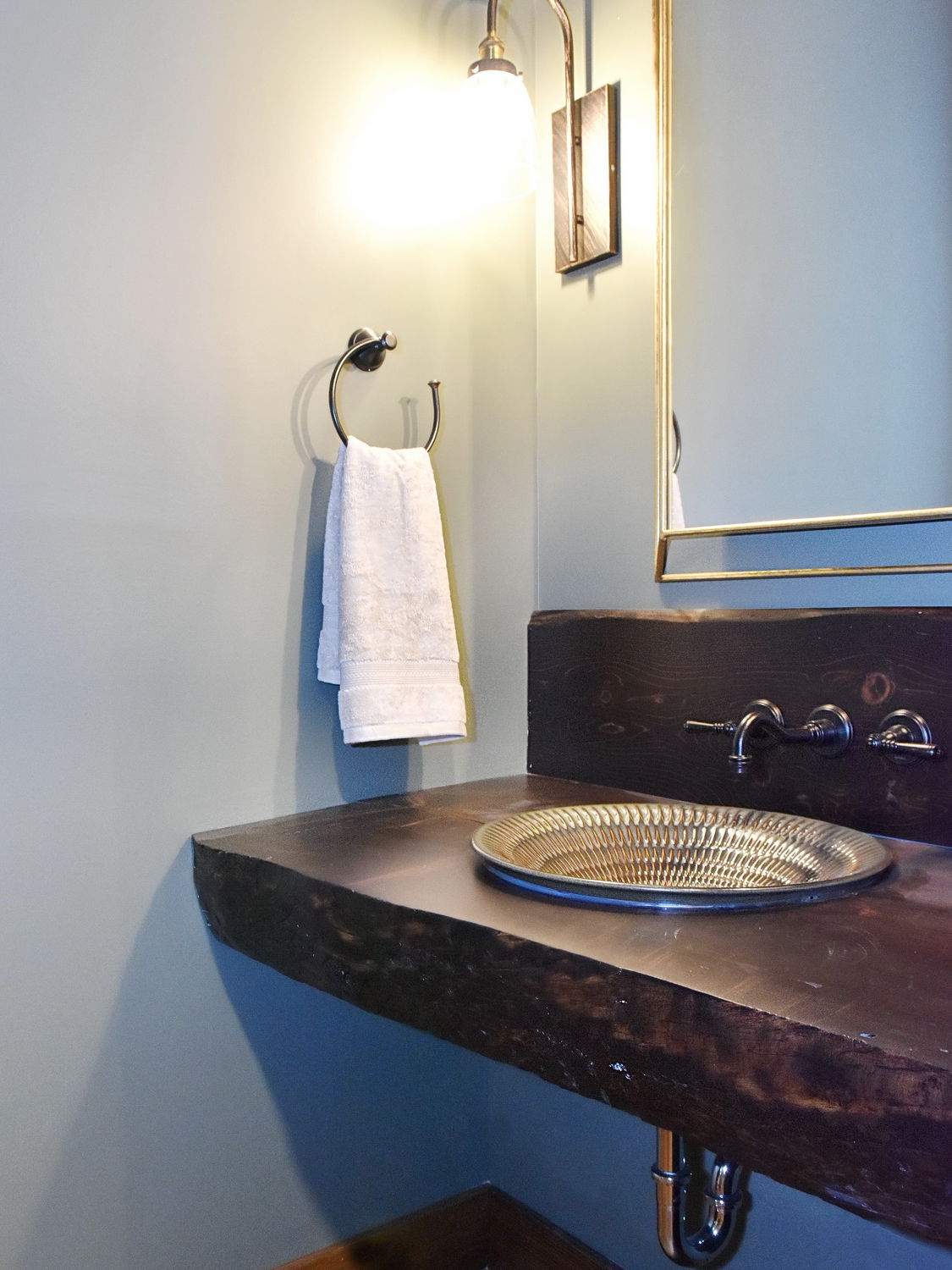 Powder room with live edge countertop and Derring sink